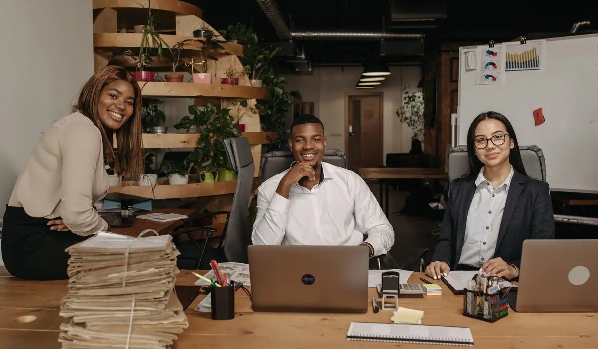 Medium shot people working together