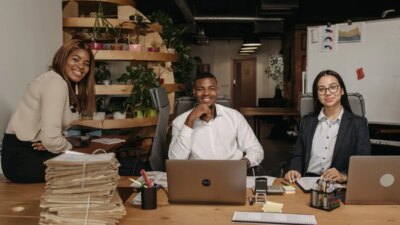 Medium shot people working together